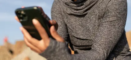 A woman using her mobile phone